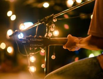 Acoustic Guitar man playing at bar