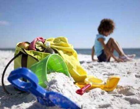 child playing on beach