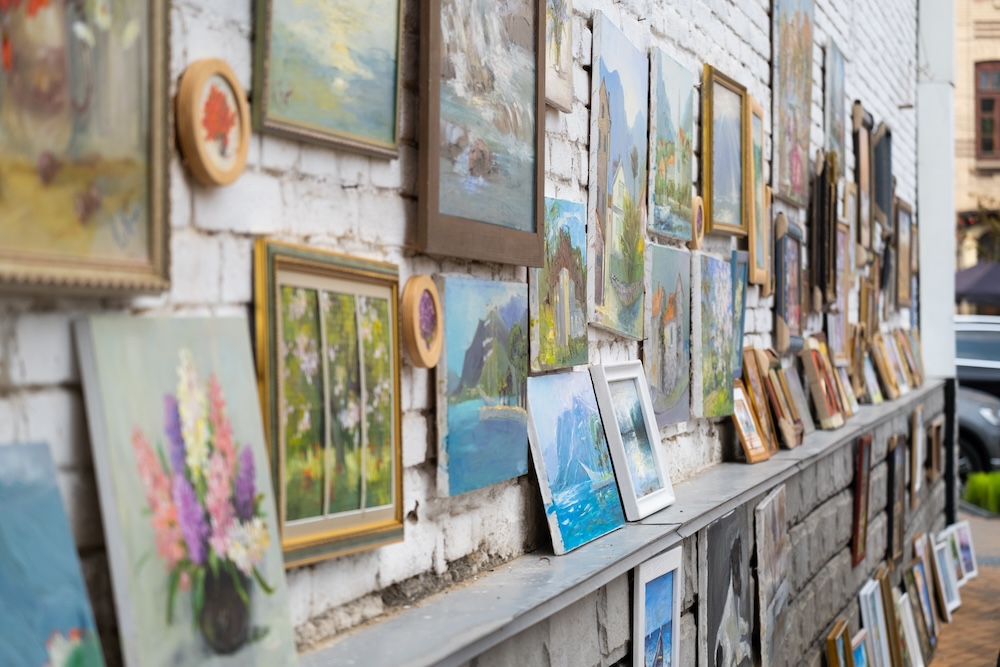 art show with canvases in on the wall